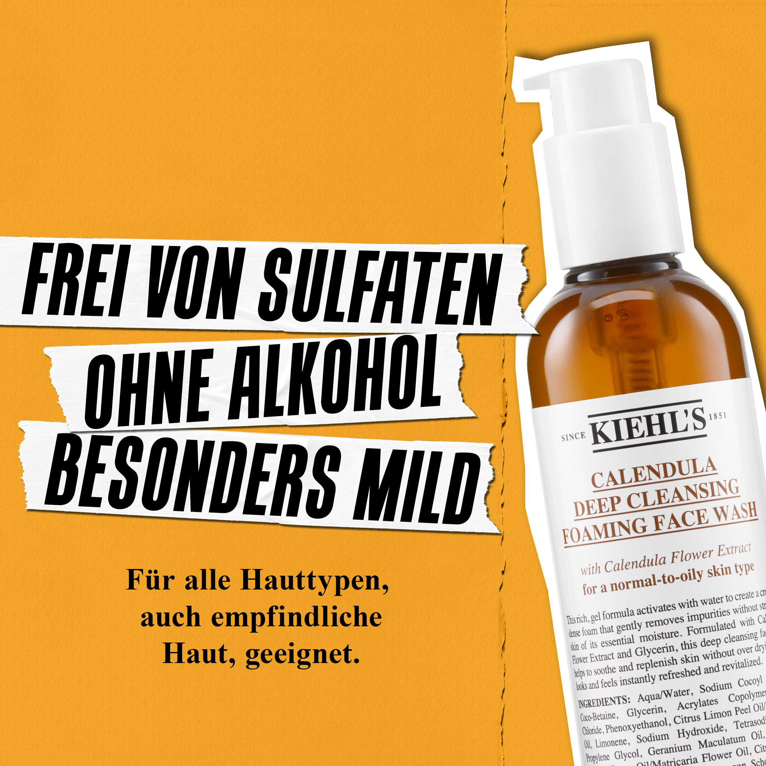 Model halt eine Flasche des Kiehl's Calendula Deep Cleaning Foaming Face Wash