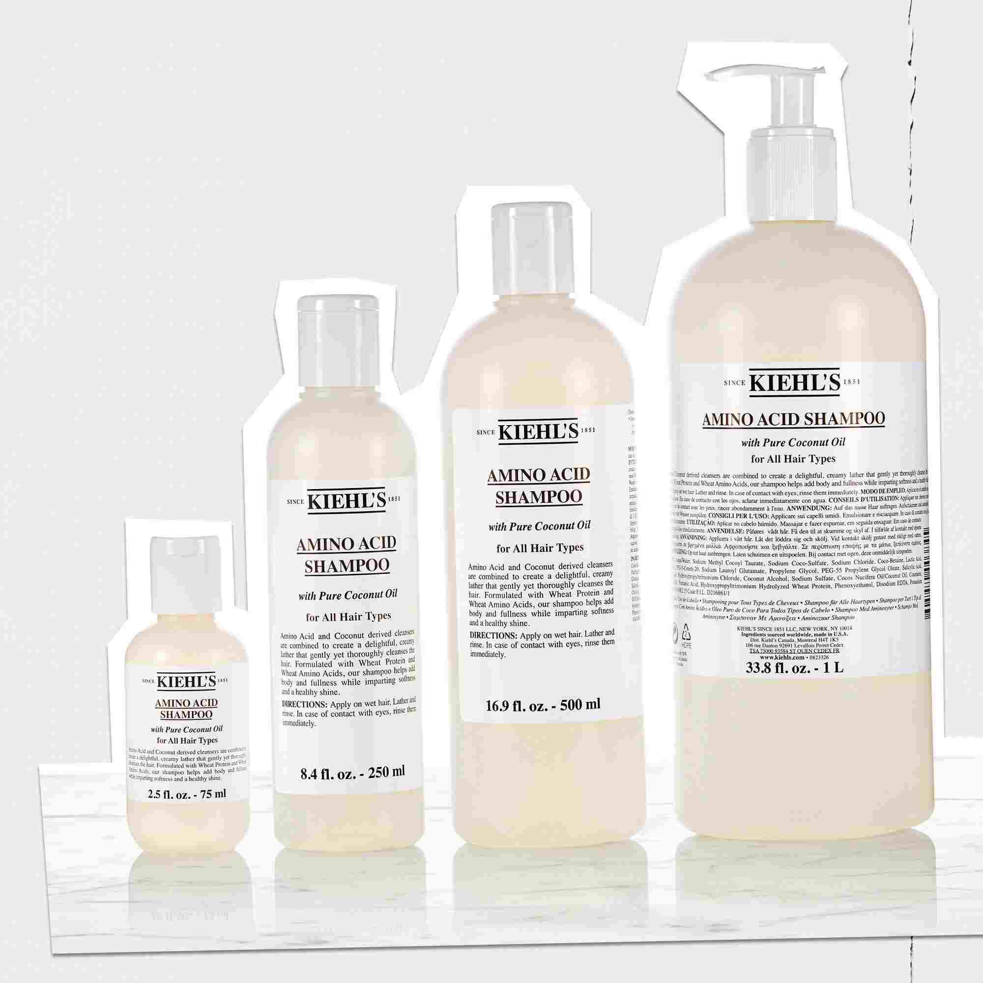 Sortiment an Kiehl's Amino Acid Shampoo-Flaschen in verschiedenen Großen