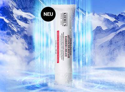 Die Ultra Facial Advanced Repair Barrier Cream von Kiehls im Vordergrund mit einem Storer Neu; im Hintergrund eine verschneite Berglandschaft