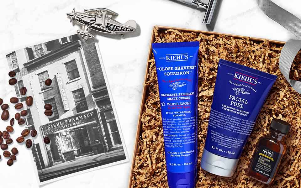 Bartpflege Produkte von Kiehls auf grauem Hintergrund
