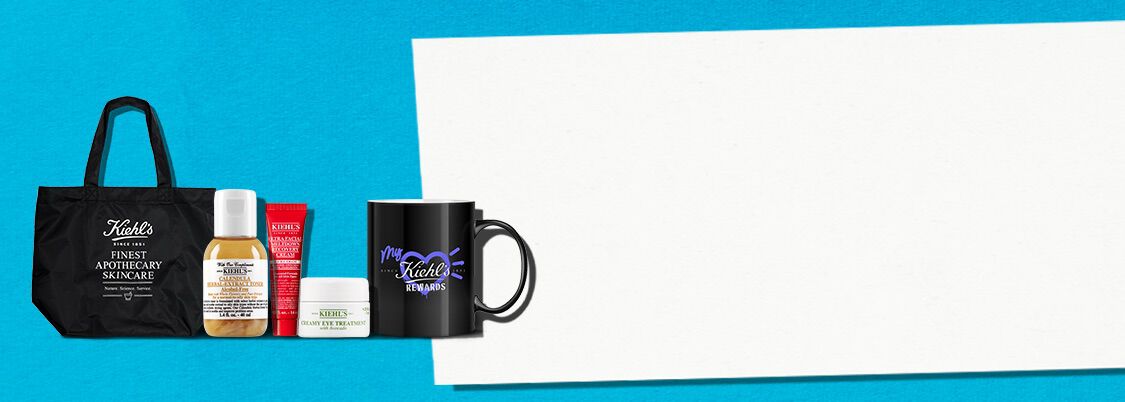 Kiehl’s Banner auf blauem Hintergrund mit funf Gratisgeschenken ab 99 €: eine schwarze Kiehl’s Tasche, Calendula Herbal‑Extract Toner, Ultra Facial Meltdown Recovery Cream, Creamy Eye Treatment und eine Kiehl’s Rewards Tasse.